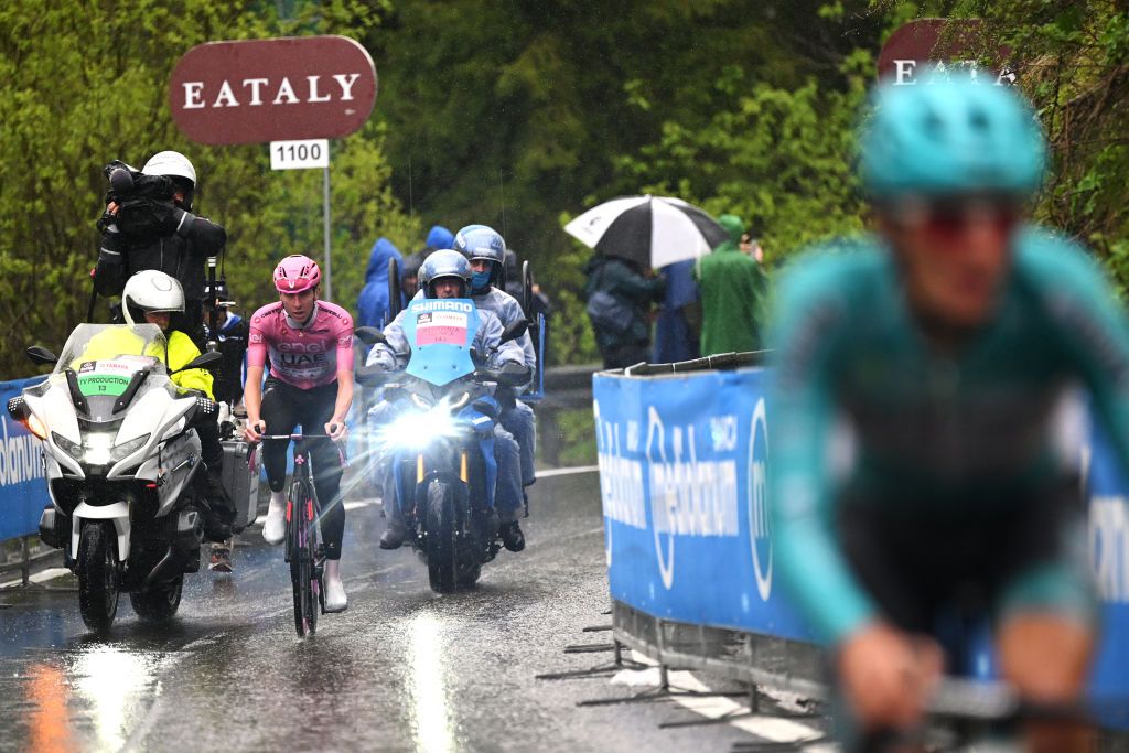 Tadej Pogačar (UAE Team Emirates) makes his way across to Giulio Pellizzarri (VF Group-Bardiani CSF-Faizan&egrave;)&nbsp;