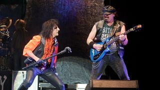 Alice Cooper (L) and Steve Hunter performing live on stage at the Alexandra Palace on October 29, 2011 in London.