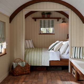 Cabin bedroom with wall panelling