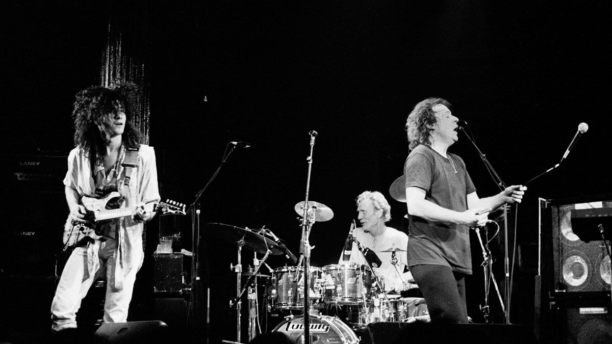 Members of the Jack Bruce Band perform at Greenwich Village&#039;s Bottom Line, New York, New York, December 7, 1989. Pictured are, from left, musicians Blues Saraceno, on guitar, Ginger Baker (1939 - 2019), on drums, and bandleader Jack Bruce (1943 - 2014), on harmonica.