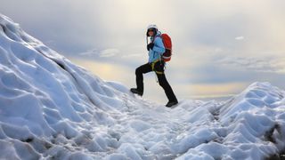 woman trekking in the snow