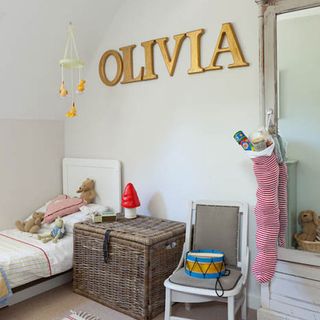 kids bedroom with large gold letters