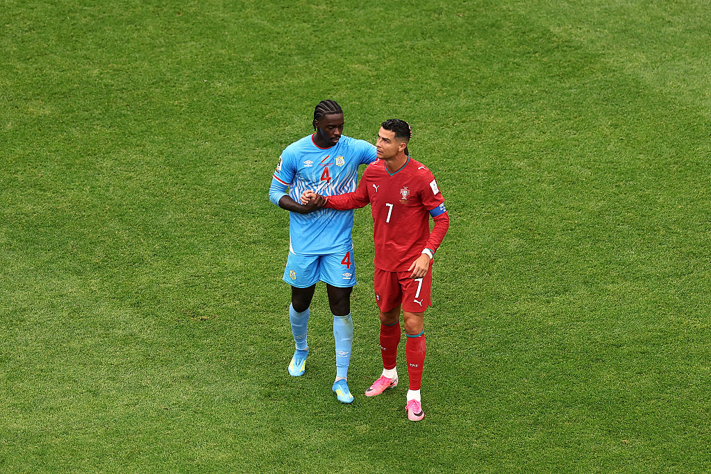 Cristiano Ronaldo of Portugal shakes hands with Axel Tuanzebe of Congo DR after the 1-1 draw during the FIFA World Cup 2026 Group K match between Portugal and Congo DR at Houston Stadium