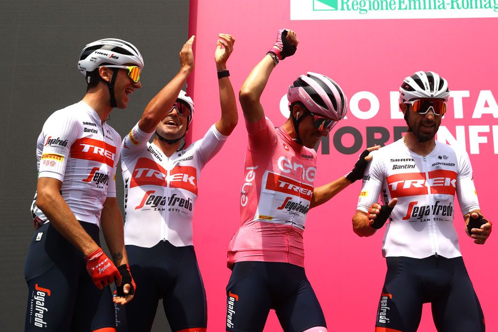 REGGIO EMILIA ITALY MAY 18 Juan Pedro Lpez of Spain and Team Trek Segafredo Pink Leader Jersey with teammates during the team presentation prior to the 105th Giro dItalia 2022 Stage 11 a 203km stage from Santarcangelo di Romagna to Reggio Emilia Giro WorldTour on May 18 2022 in Reggio Emilia Italy Photo by Michael SteeleGetty Images