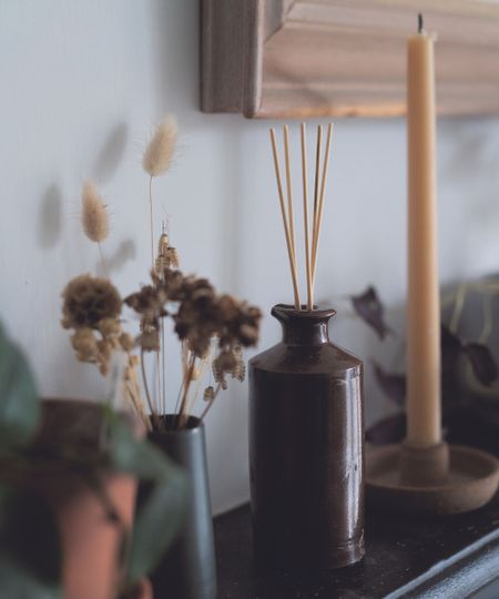 Essential oils, candle and pots