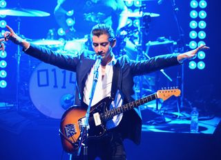 Alex Turner performing with Arctic Monkeys in 2014.