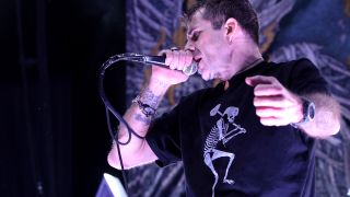 Randy Blythe onstage with Lamb Of God in 2024