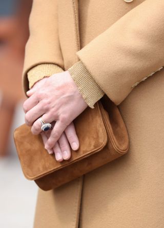 Kate Middleton beige clutch bag that Prince William carried