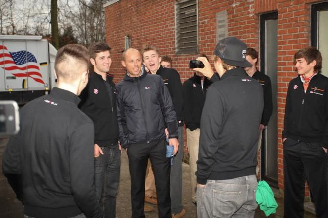 Cody Kaiser shoots a snap of Tobin Ortenblad with Sven Nys with a little help from the peanut gallery.