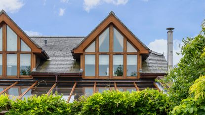 House exterior with tile detail and porch