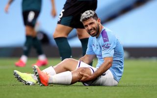 Sergio Aguero was forced off with a knee injury