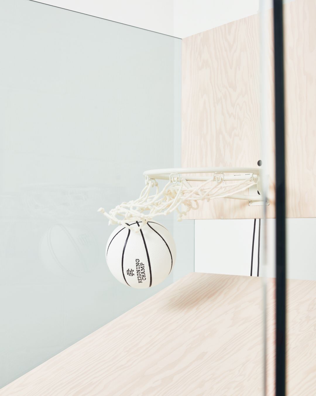 Basketball swooping through the net