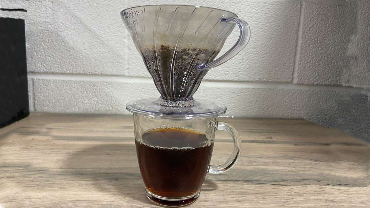 a photograph of the Hario V60 being used to brew coffee