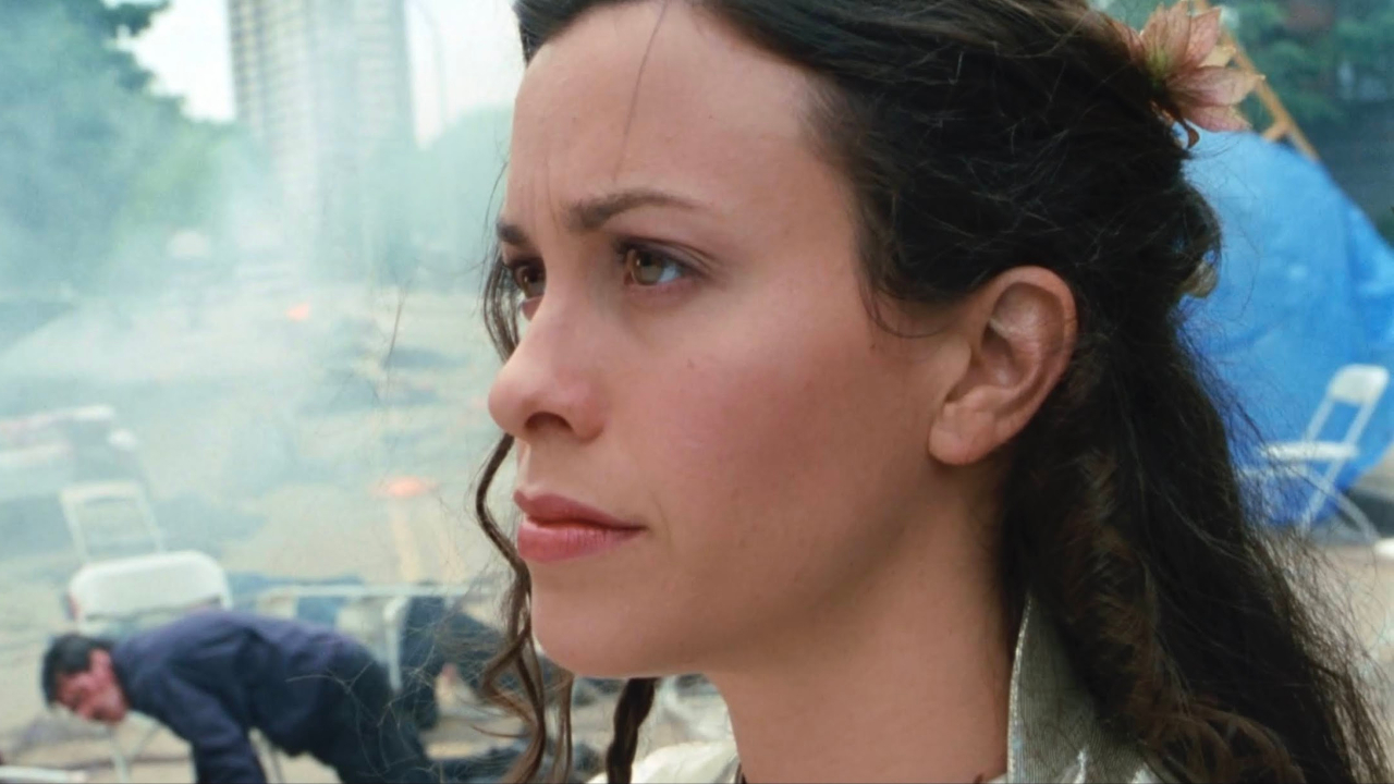Alanis Morissette looks forward stoically in Dogma.
