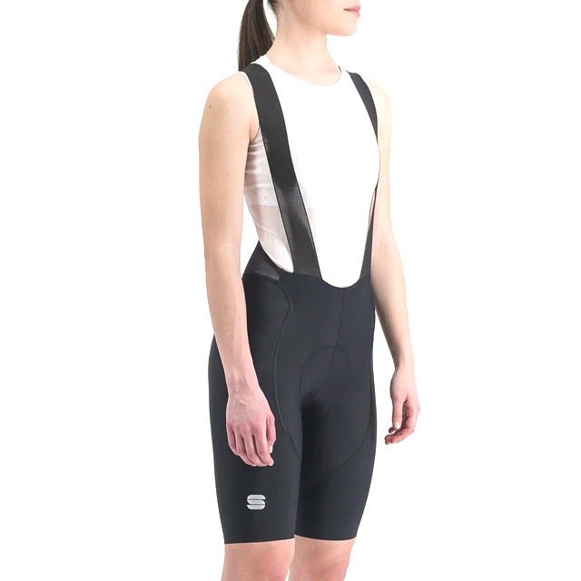 sportful classic bib shorts modelled by a female rider, sporting a white baselayer.