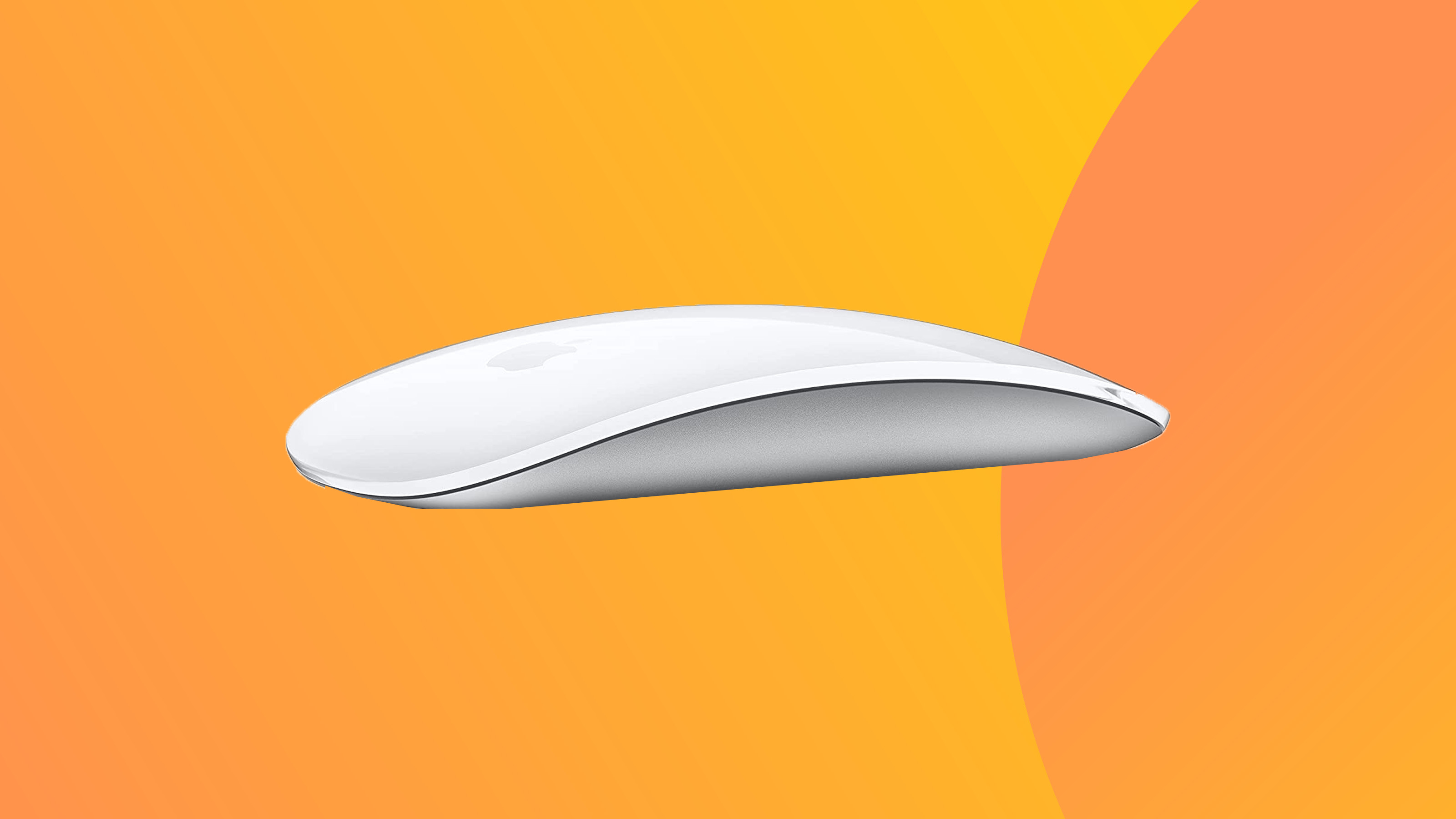 A product shot of the apple magic mouse on a colourful background