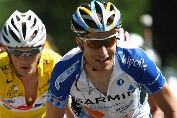 American Christian Vandevelde (Garmin-Chipotle) rides ahead of overall leader Frank Schleck (Team CSC) part-way through stage 16.