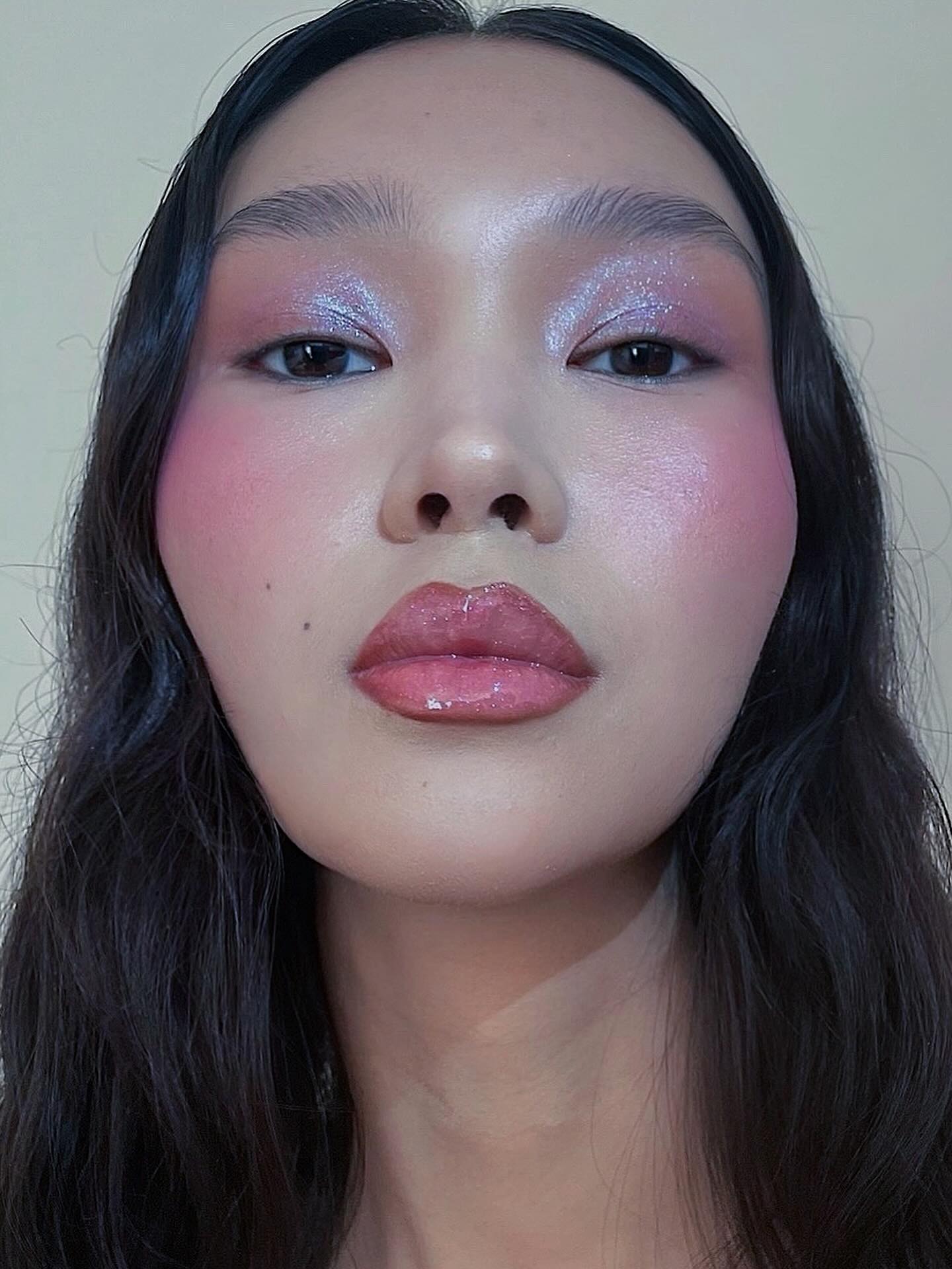 Frosty pink makeup.