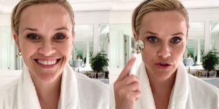 Reese Witherspoon demonstrates her skincare routine in a mirror.