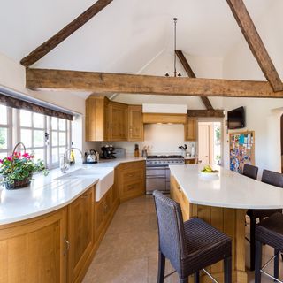 kitchen room with kitchen cabinets and dining table