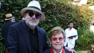 Bernie Taupin with Elton John