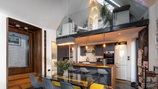 open plan kitchen diner with mezzanine home office