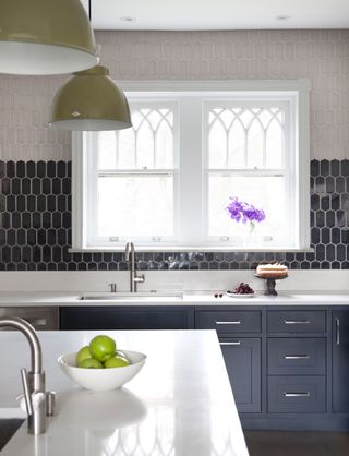 blue kitchen cabinets and tiled backsplash by Melinda Kelson O'Connor