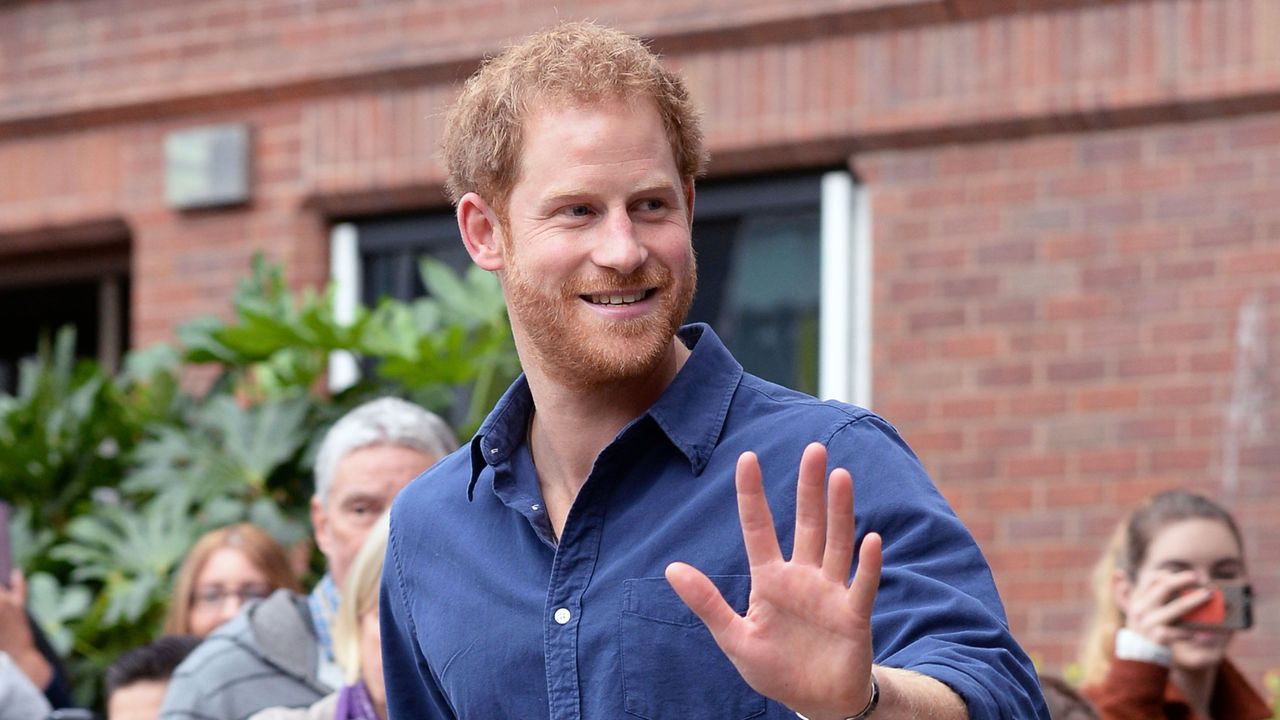 nottingham, england october 26 prince harry waves as he leaves nottingham&#039;s new central police station on october 26, 2016 in nottingham, england photo by joe giddins wpa poolgetty images