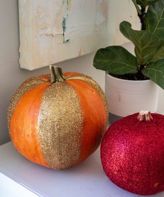 pumpkins painted with glitter