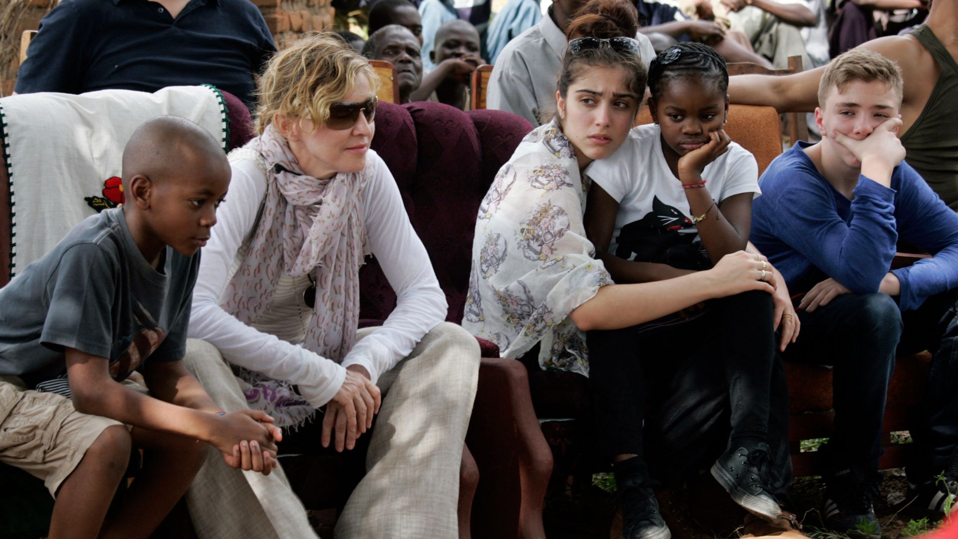 Madonna with some of her children during a visit to Malawi