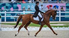 Karin Donckers and Leipheimer Van&rsquo;t Verahof in the eventing dressage at the Paris Olympic Games.