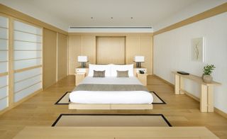 Wooden floor & walled guestroom