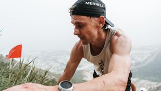 Ultra runner Harry Jones fueling during a race