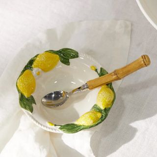 A set of four citrus bowls