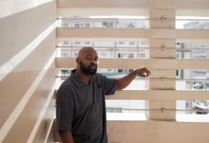 emerging designer portrait of Olorunfemi Adewuyi on the rooftop of his office in Onikan, Lagos