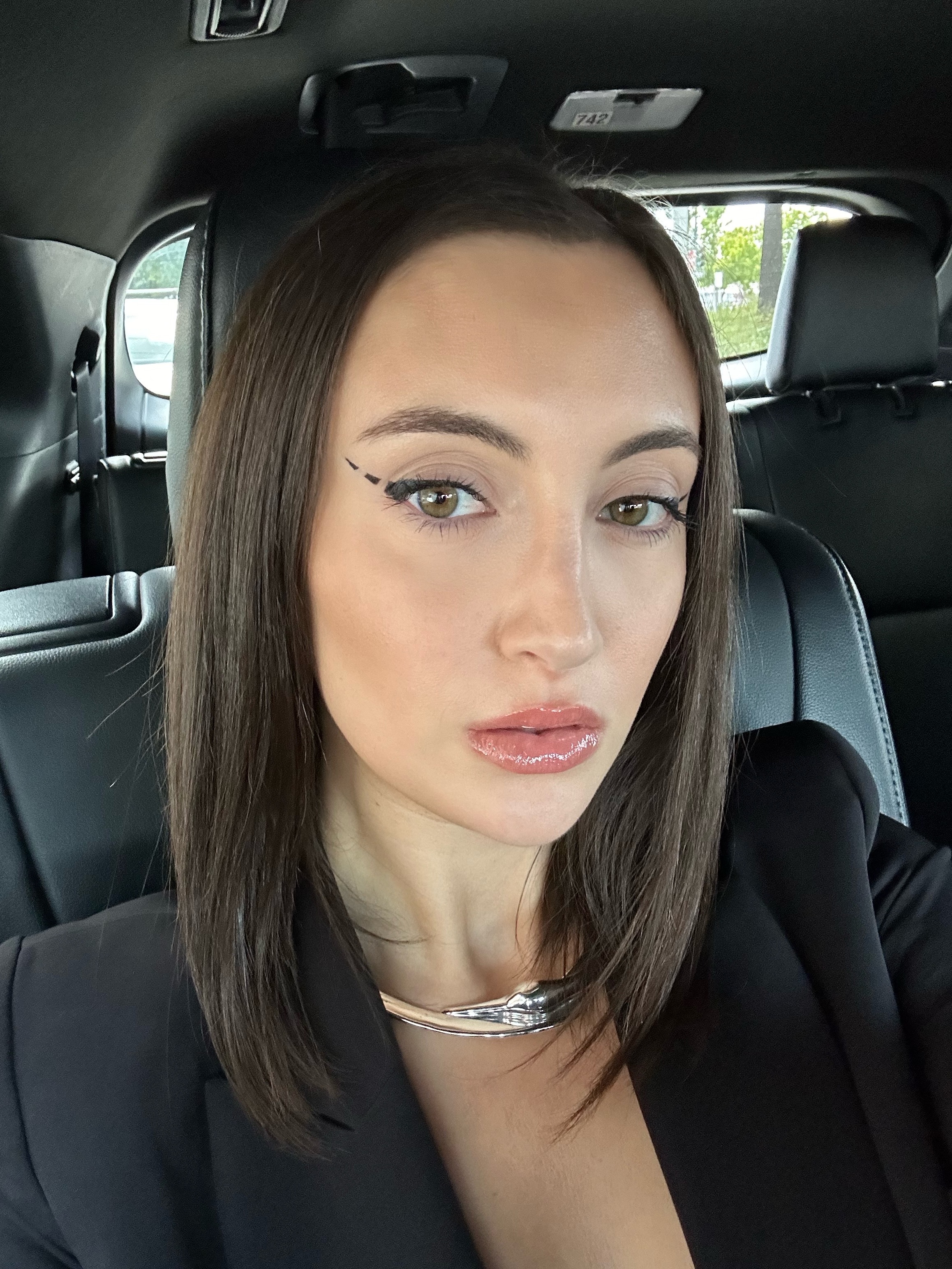 Alyssa Brascia with straight, flat-ironed hair.