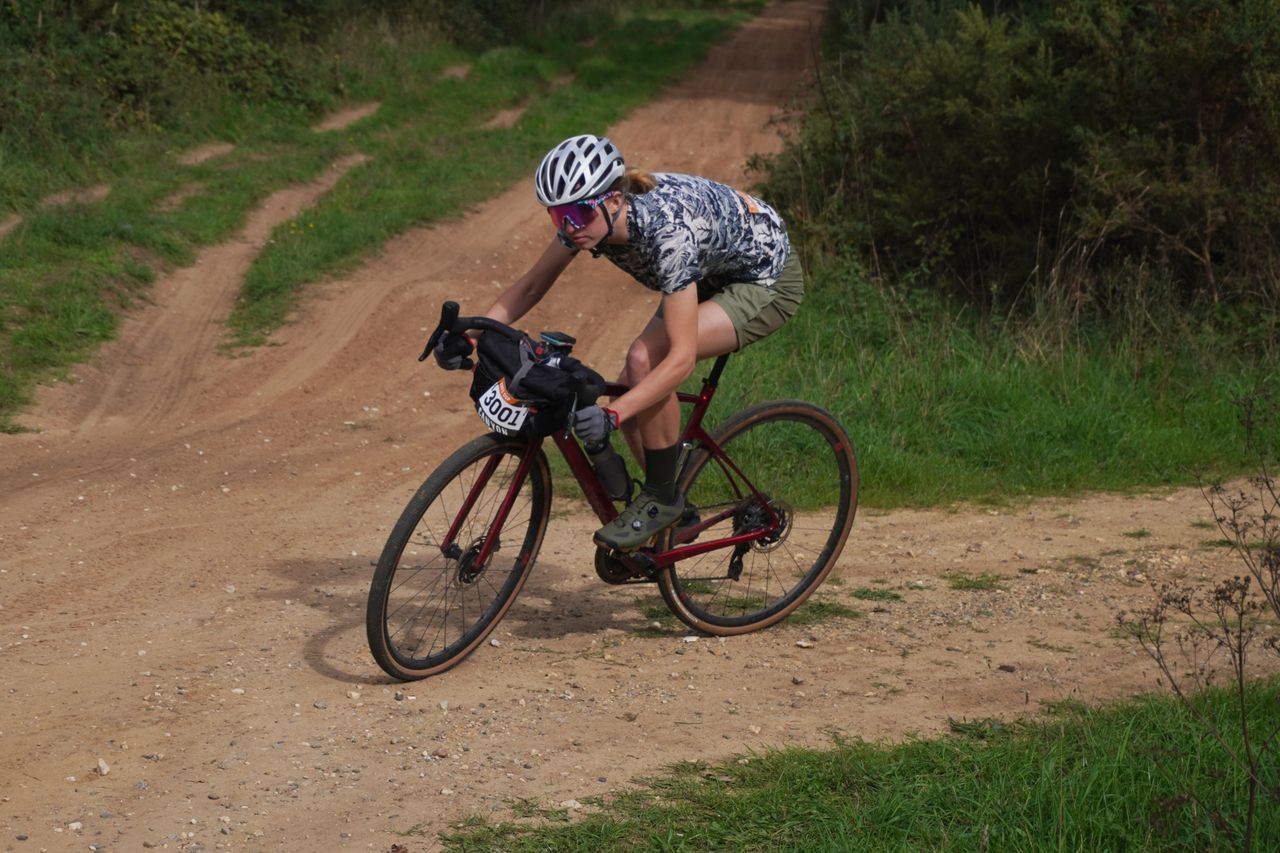 Image shows Anna Abram competing at the British Gravel Championships at the King&#039;s Cup Gravel.