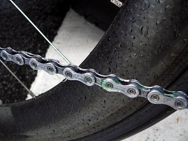 Team CSC mechanics applied Shimano's telltale nuclear-green grease to their riders' chains to keep them lubricated and running smoothly in the wet conditions of Stage 4. Like most teams, Team CSC was running aerodynamic deeper-section carbon fiber wheels (from Zipp, in this case).