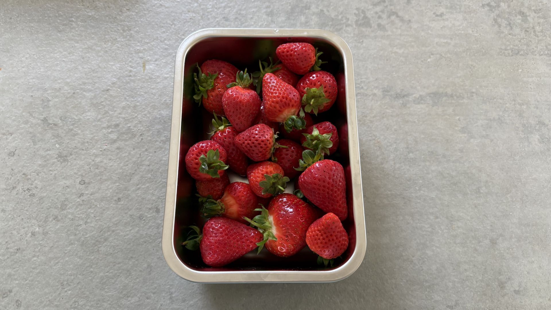 One of the IKEA Stainless Steel Food Containers with strawberries in