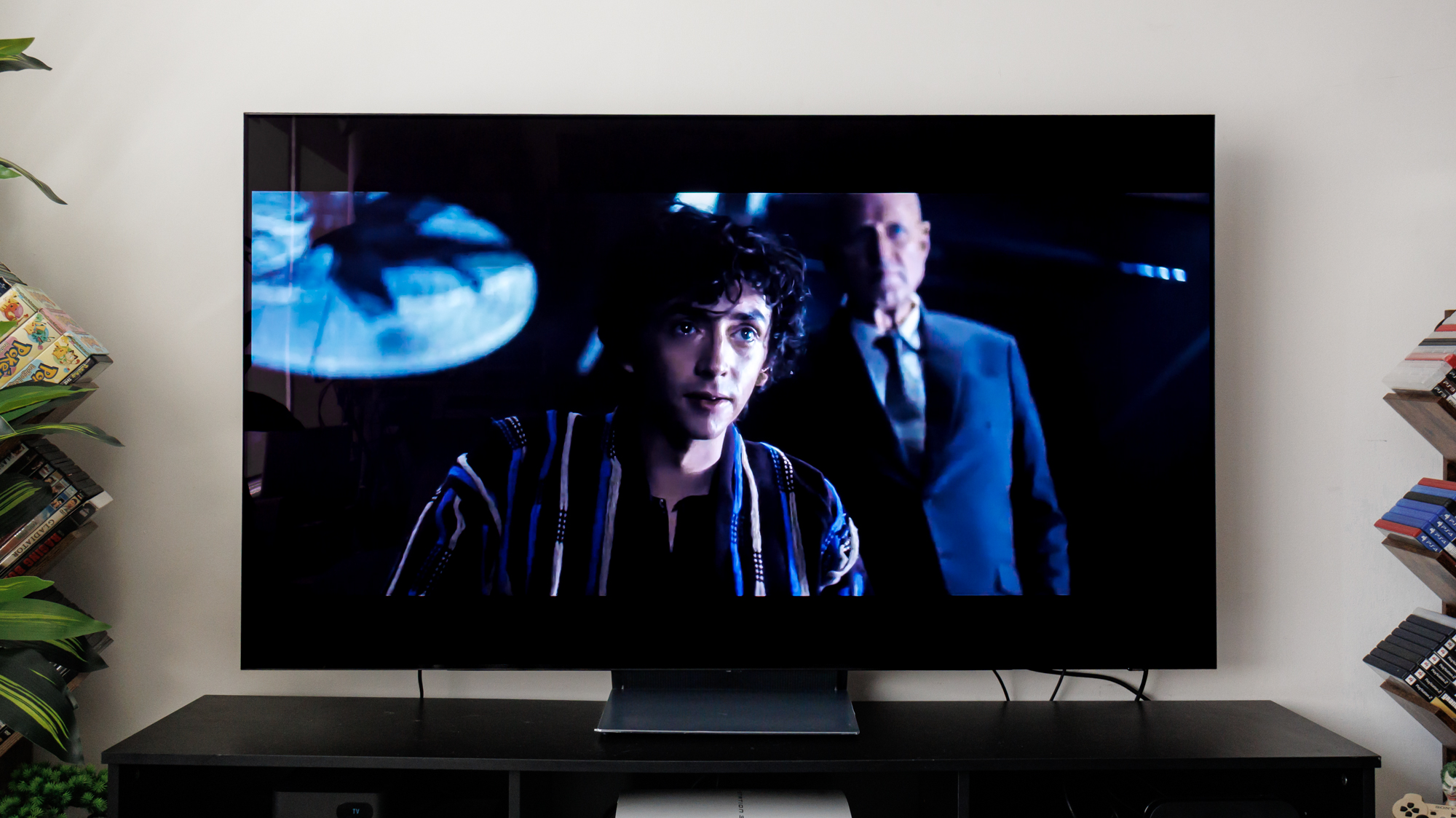 Samsung S90F OLED TV on a cabinet