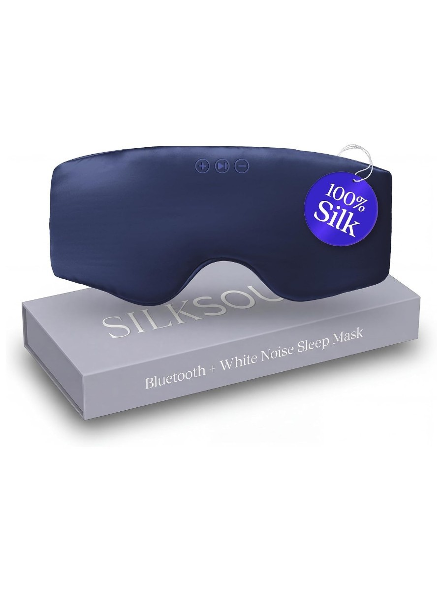 The SilkSound Bluetooth Sleep Mask balanced on its box, against a white background