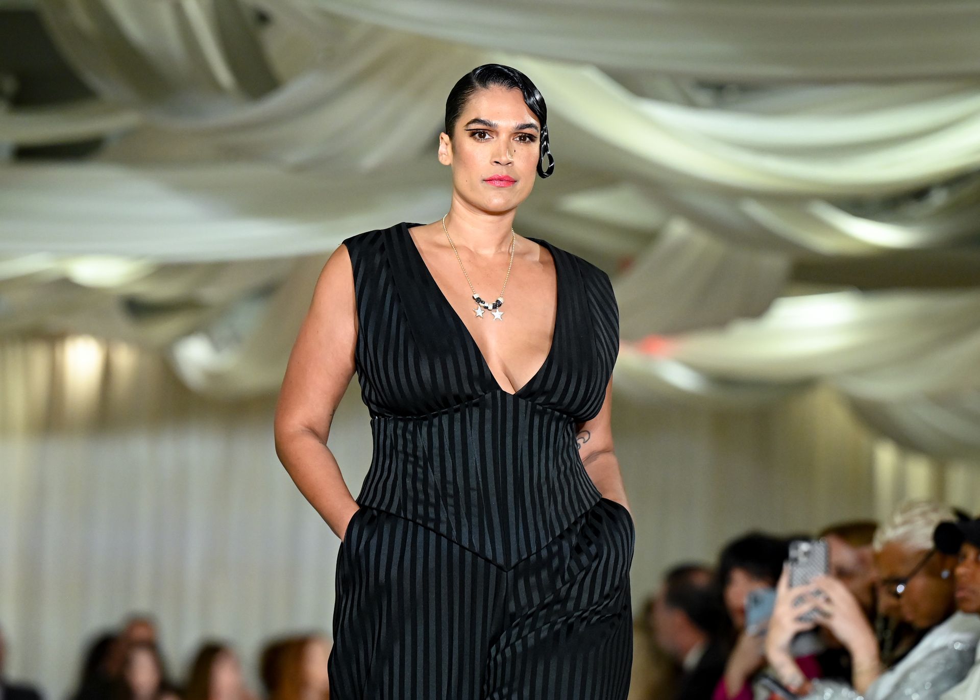 Jennifer Atilémile on the runway at NYFW for Christian Siriano.
