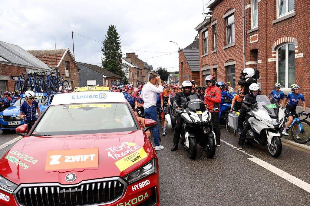 LIEGE BELGIUM AUGUST 14 A general view of the peloton stopped due to a train crossing during the 3rd Tour de France Femmes 2024 Stage 4 a 1227km stage from Valkenburg to Liege UCIWWT on August 14 2024 in Liege Belgium Photo by Alex BroadwayGetty Images
