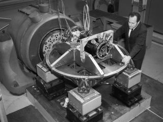 A photograph of the SNAP-8 generator from the Lewis Research Center, part of NASA's Systems for Nuclear Auxiliary Power (SNAP) program. Here, engineers exposed the system to shocks and vibrations expected to occur during a launch into space and subsequent maneuvering.