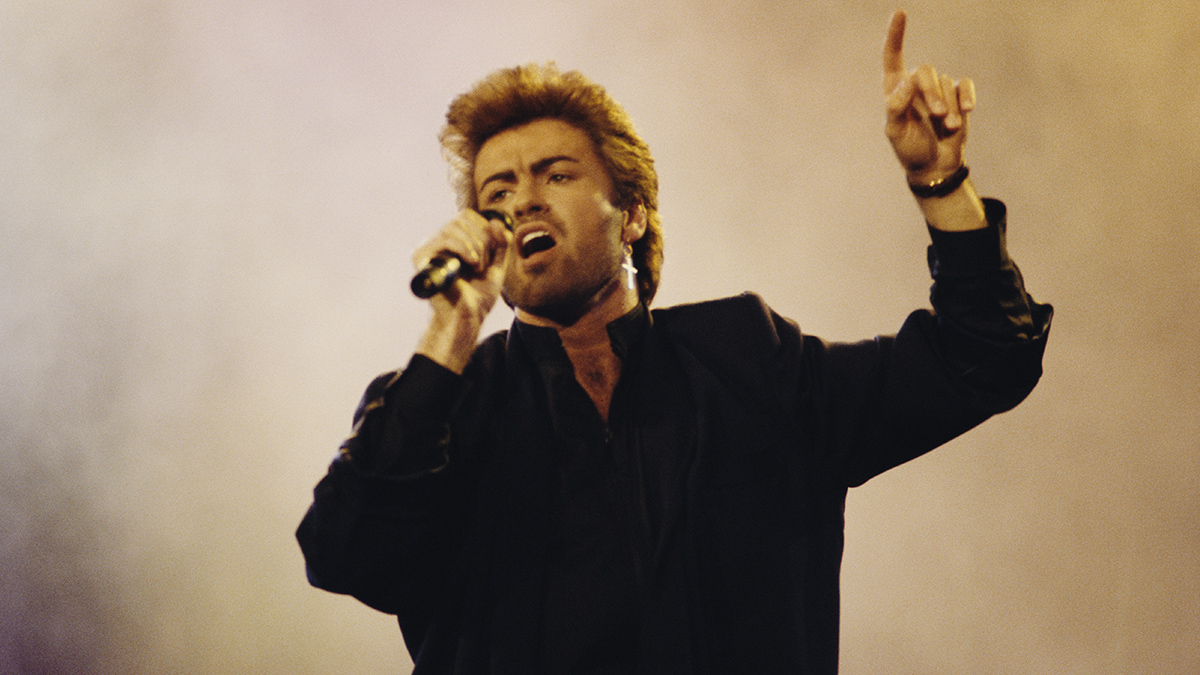 English singer, songwriter and musician, George Michael (1963-2016) performs live on stage at an Aids awareness charity concert at Wembley Arena in London in April 1987. (Photo by Michael Putland/Getty Images)