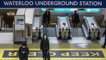 Commuters make their way through Waterloo Station