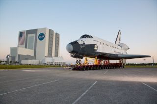 The mock orbiter "Inspiration" was rolled past the Vehicle Assembly Building (VAB) on its way to the Shuttle Landing Facility at NASA’s Kennedy Space Center in Florida on April 27, 2016.