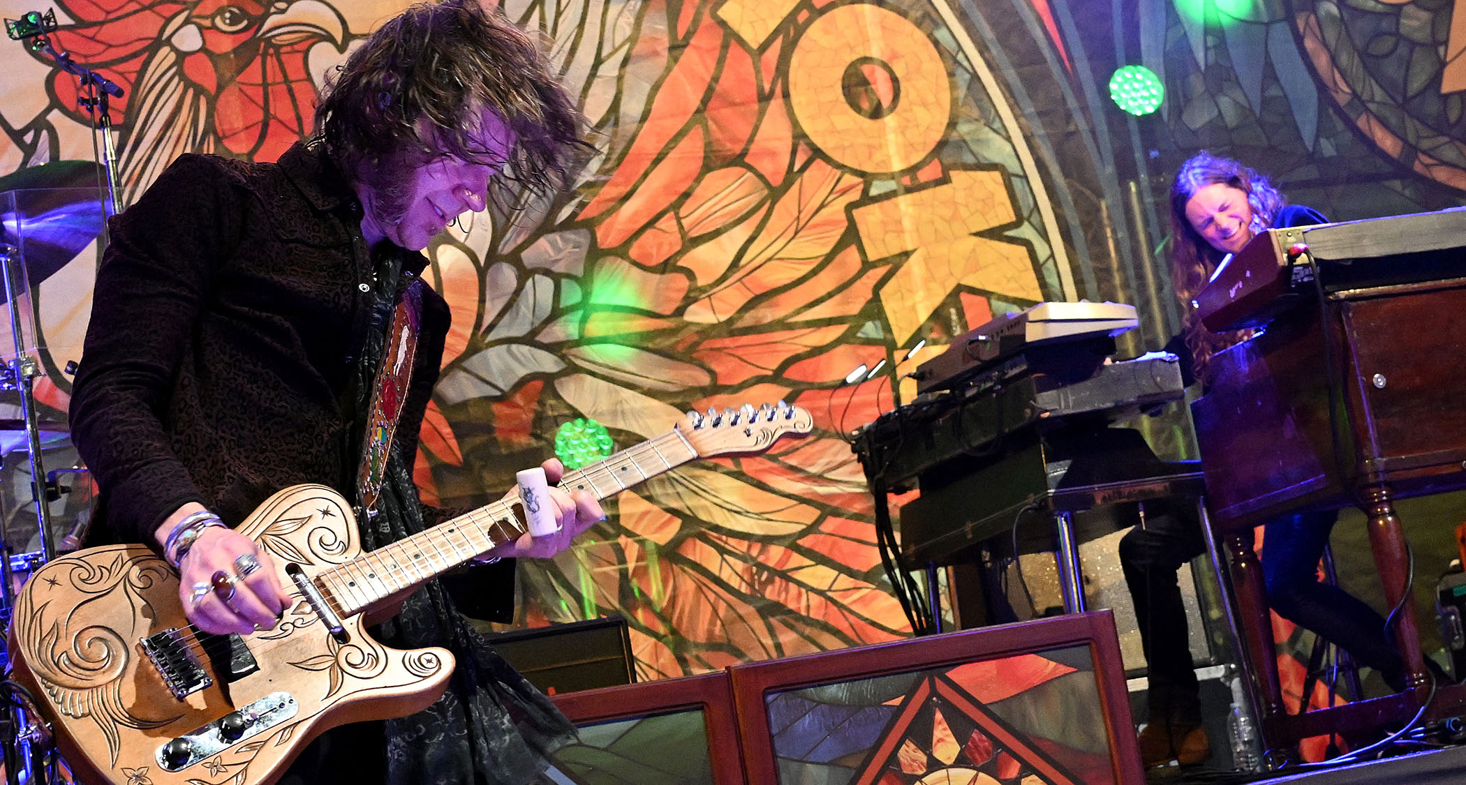 Charlie Starr takes a slide solo when playing a custom-tooled Telecaster onstage with Brandon Still of Backberry Smoke