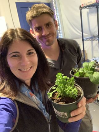 Officers Lori Waters and Jack Bryan with freshly harvested salad from our LettuceGrow hydroponics greenhouse.