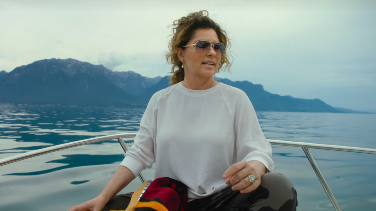 Shania Twain sitting on a boat in Shania Twain: Not Just a Girl